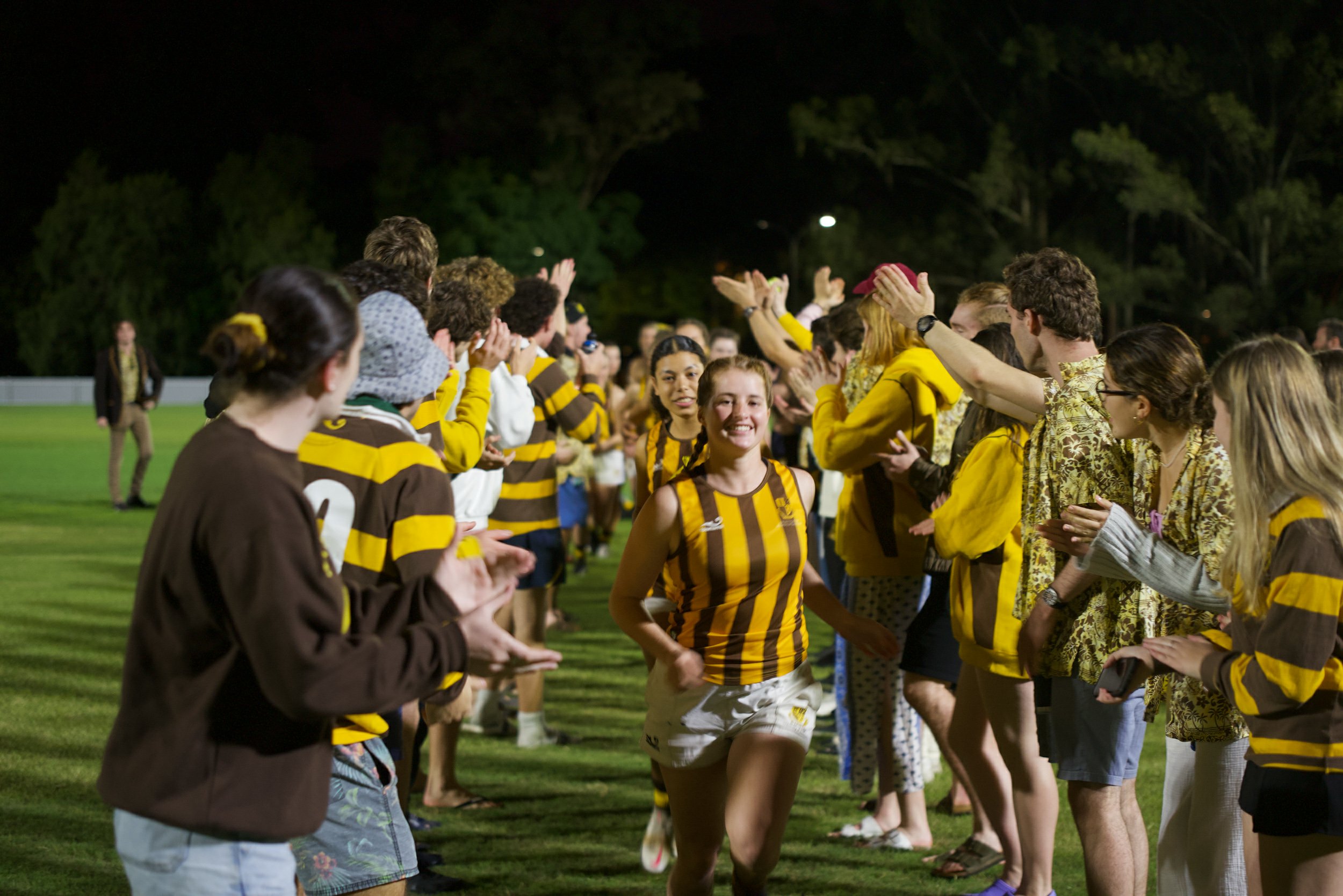 University of queensland student athletes playing footie