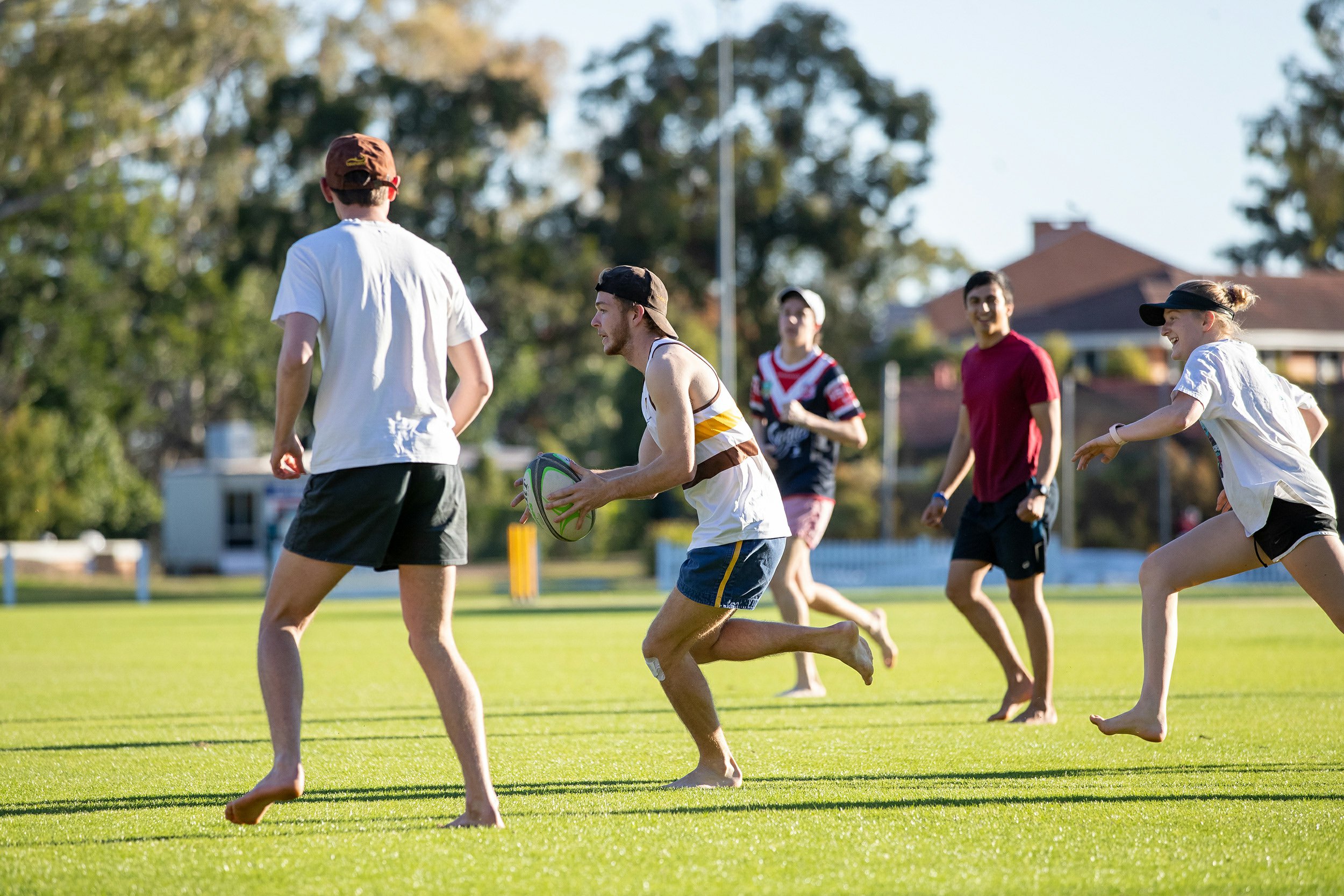University of queensland student athletes playing footie