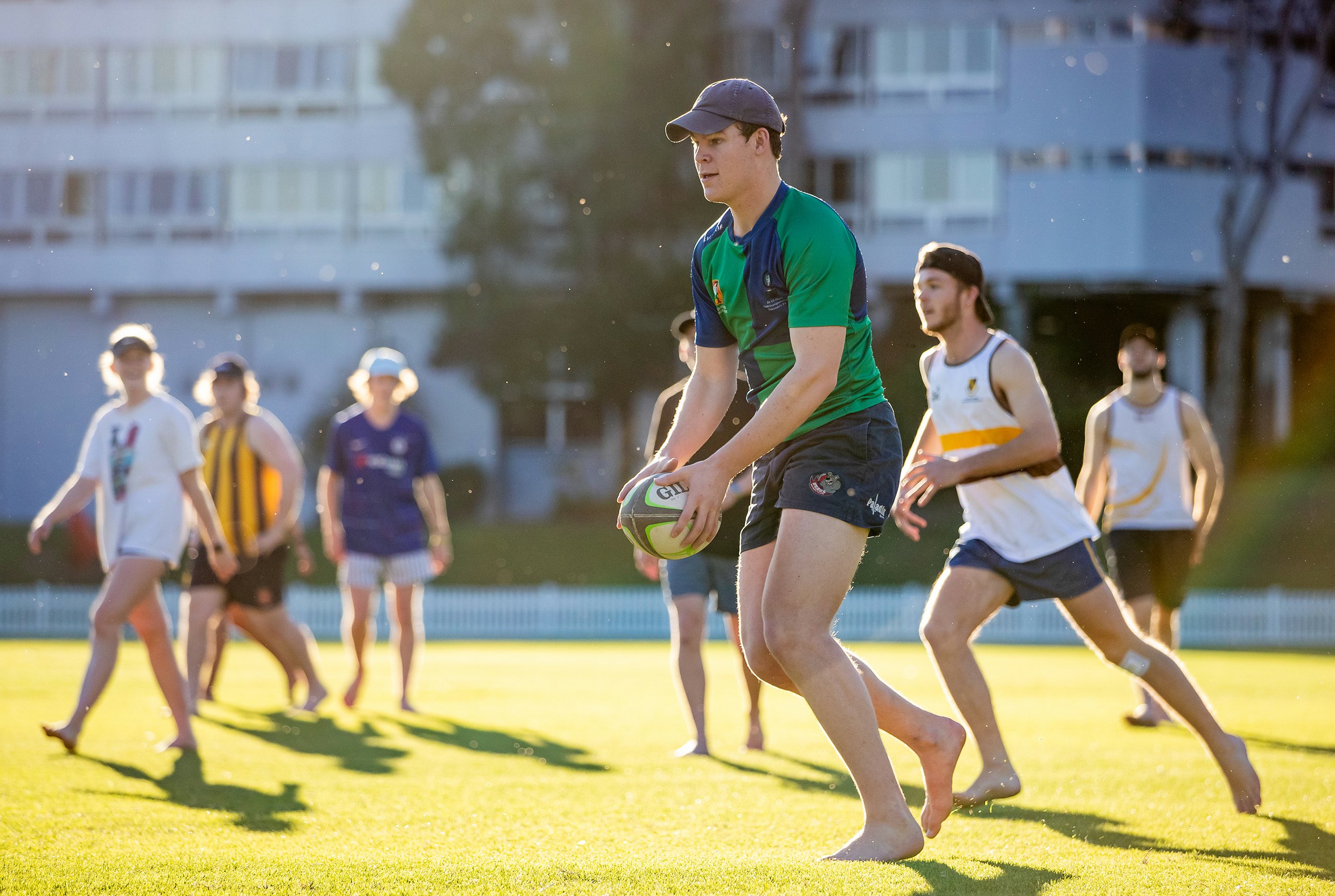 University of queensland student athletes playing footie