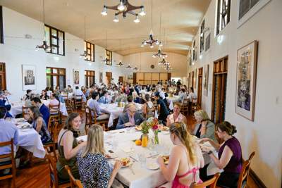 Alumni socialising in the St John's College grounds 