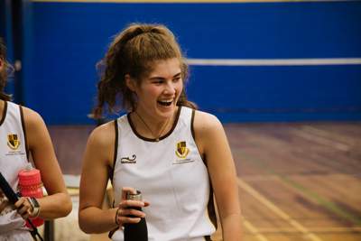 Photograph of student playing badminton