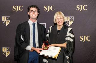 Chris Ktenidis with Professor Deborah Terry AC, Vice-Chancellor and President of UQ