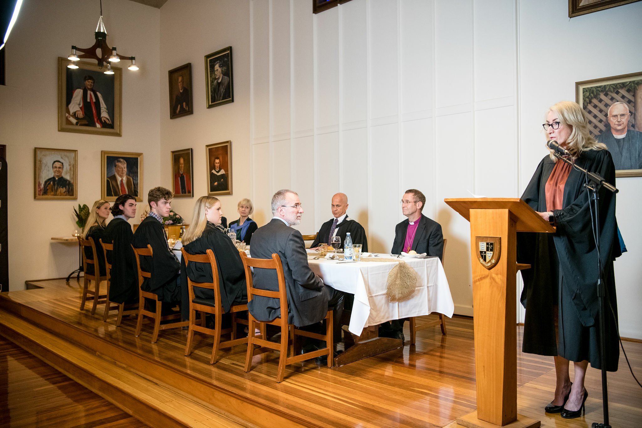 Ceremony in formal robes at SJC residential college UQ dinner
