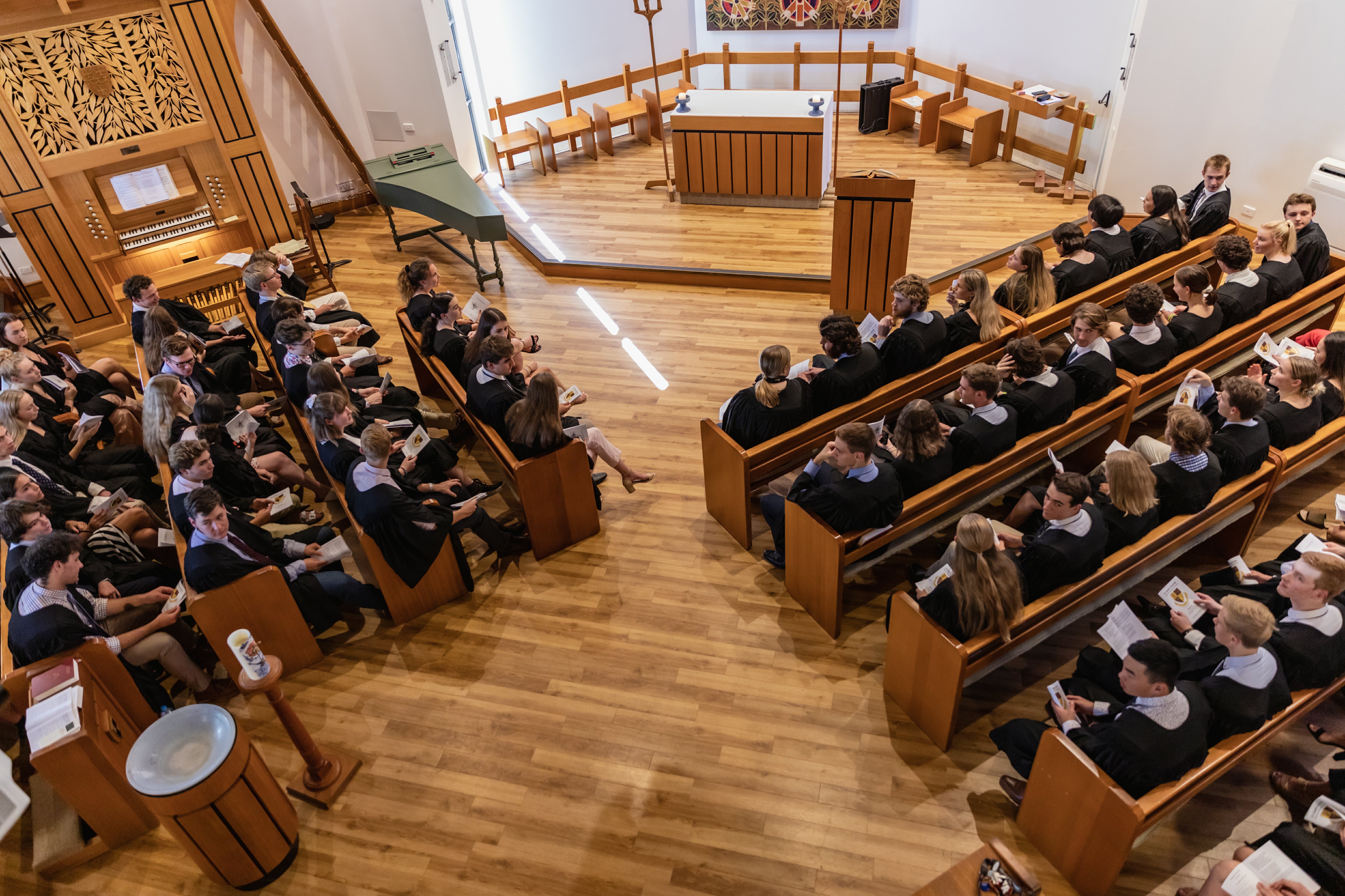 Formal attire at a service in the SJC UQ College Chapel